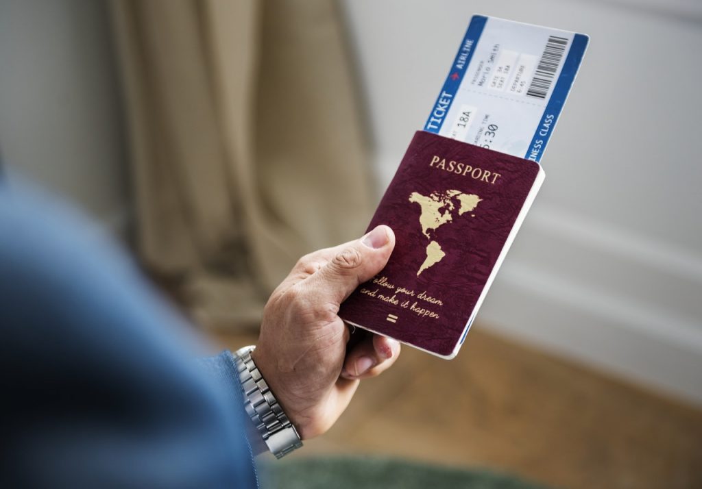 Man holding a passport