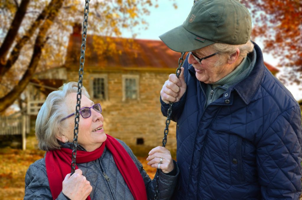 old couple on swing